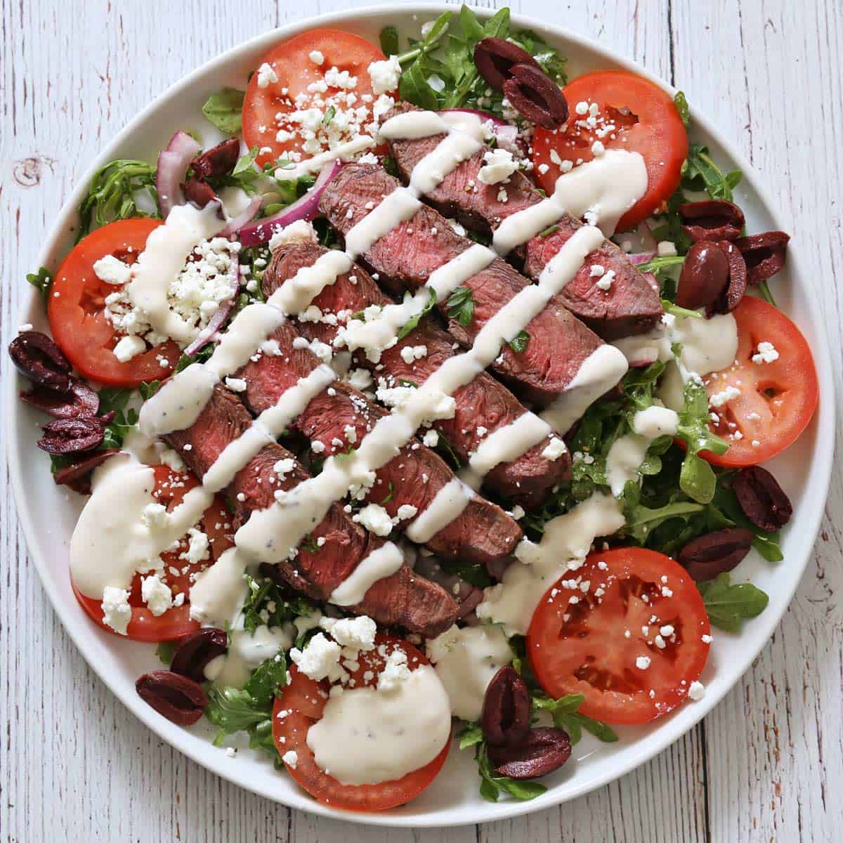 Steak salad variation with flat iron steak and ranch dressing.