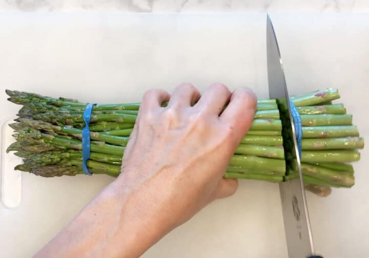 Trimming the asparagus.