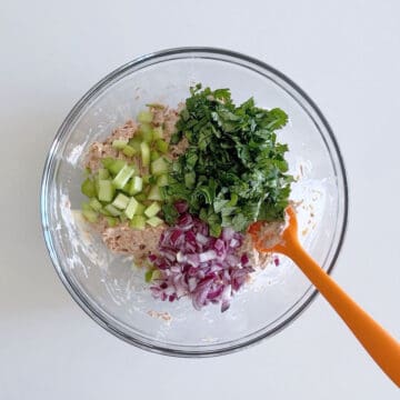 Celery, red onion, and cilantro were added to the salad.