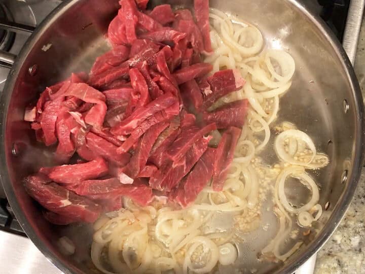 The beef was added to the skillet.