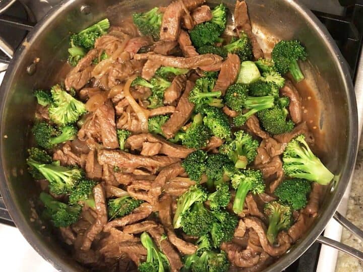 The broccoli was added to the skillet.