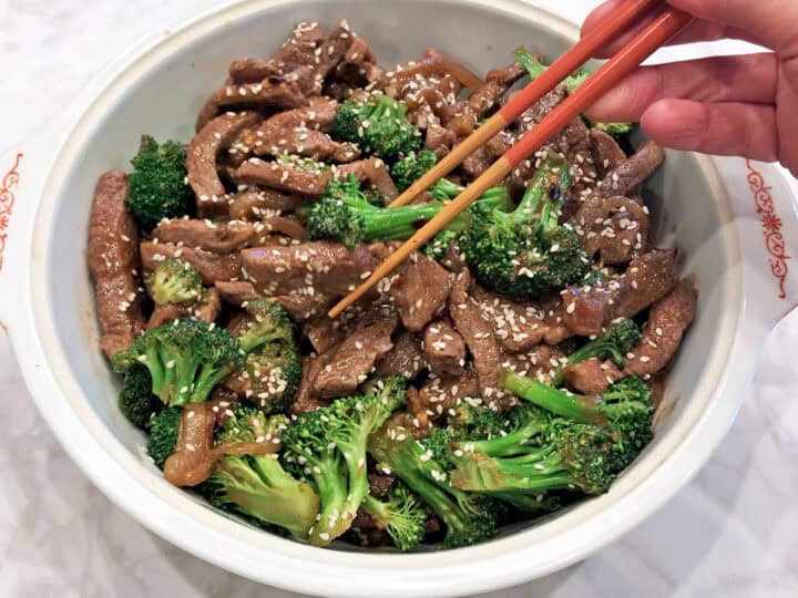 The dish is served with chopsticks.