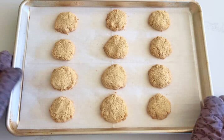 The cookies are fully baked in the pan.