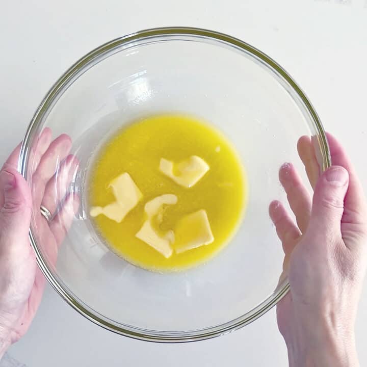 Melted butter in a bowl.