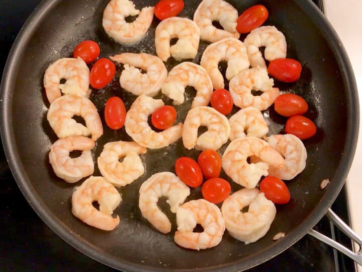 The shrimp are partially cooked.