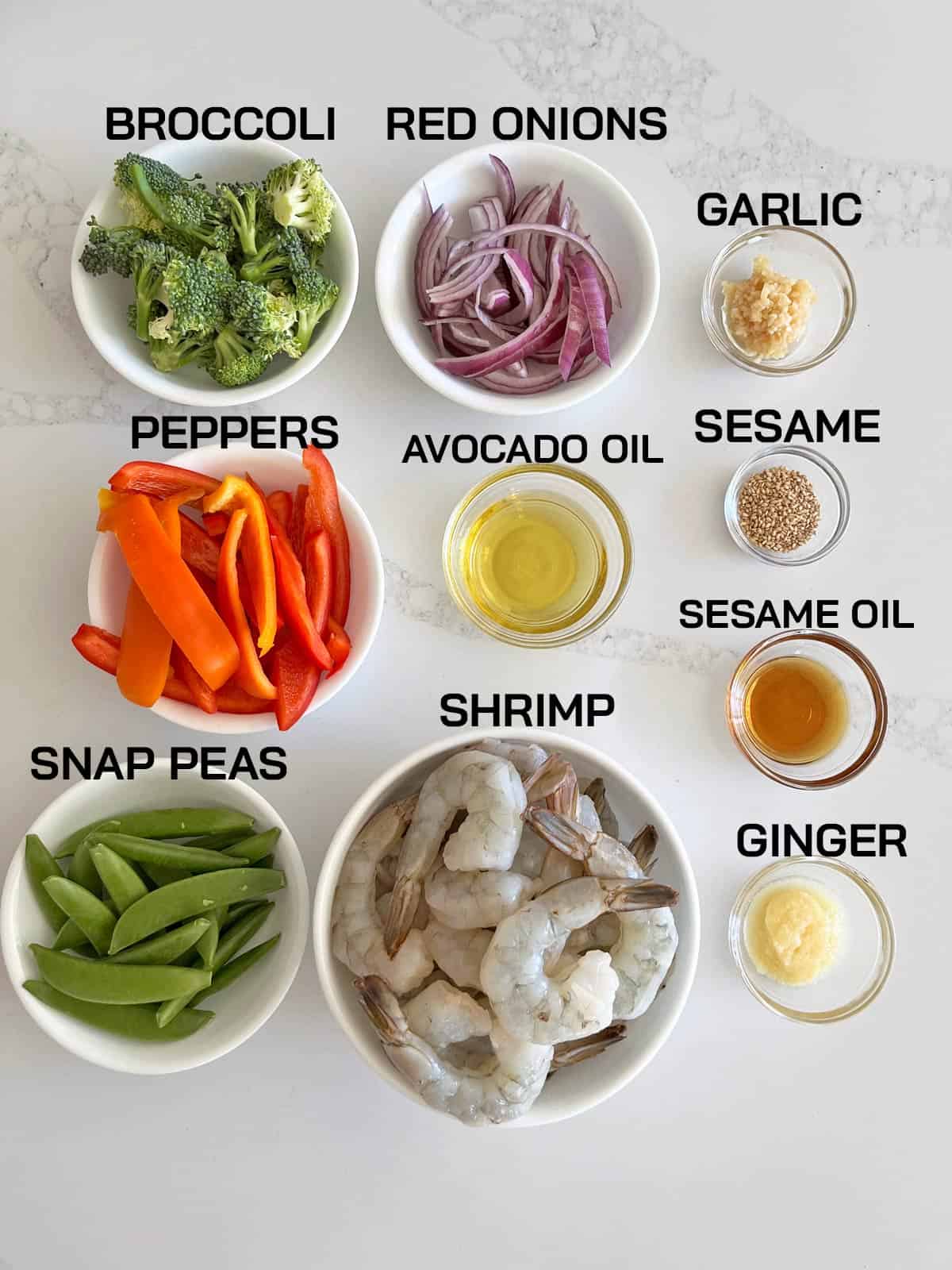 The ingredients needed to make a shrimp stir fry.