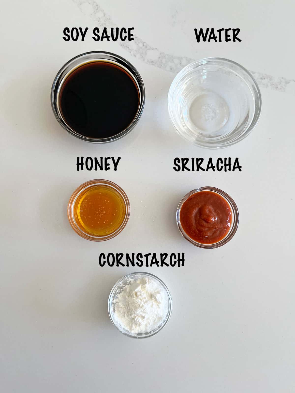 The ingredients needed to make a sauce for shrimp stir fry.