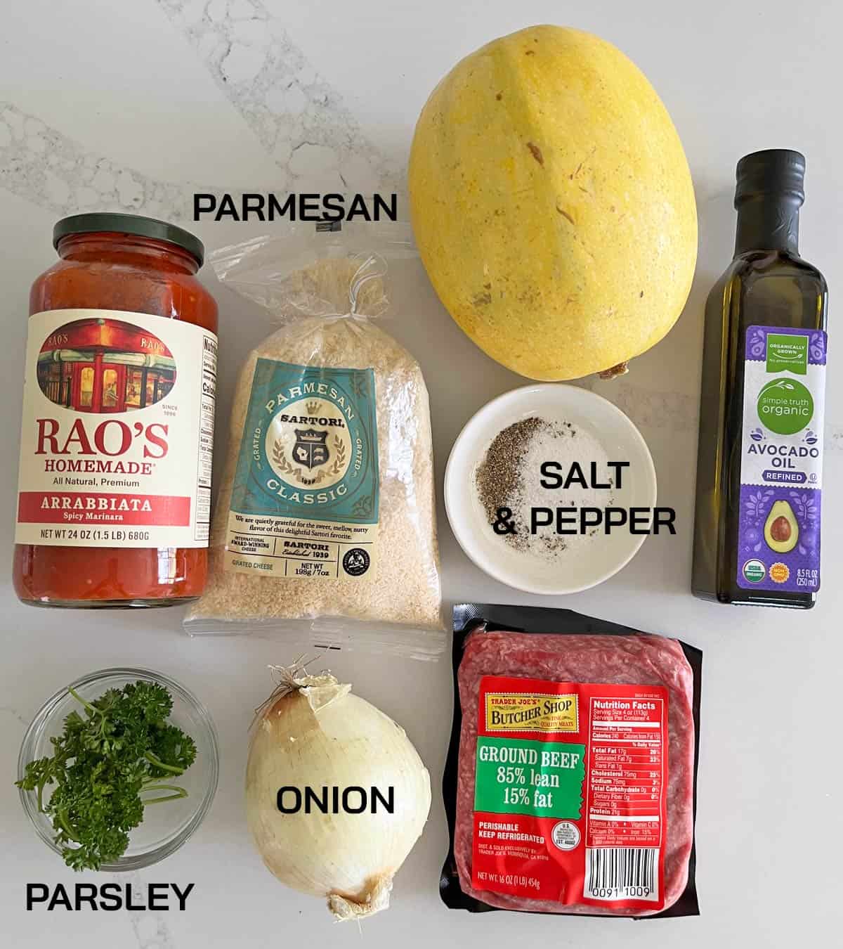 The ingredients needed to make spaghetti squash with meat sauce.