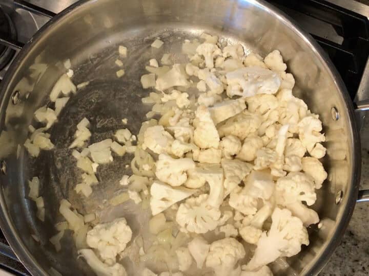 Cauliflower was added to the stockpot.