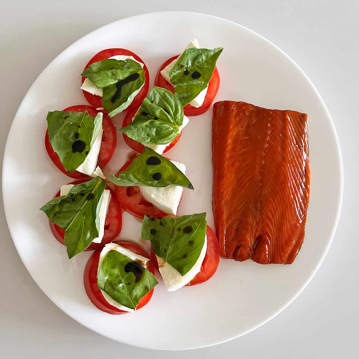 Caprese salad with smoked salmon.