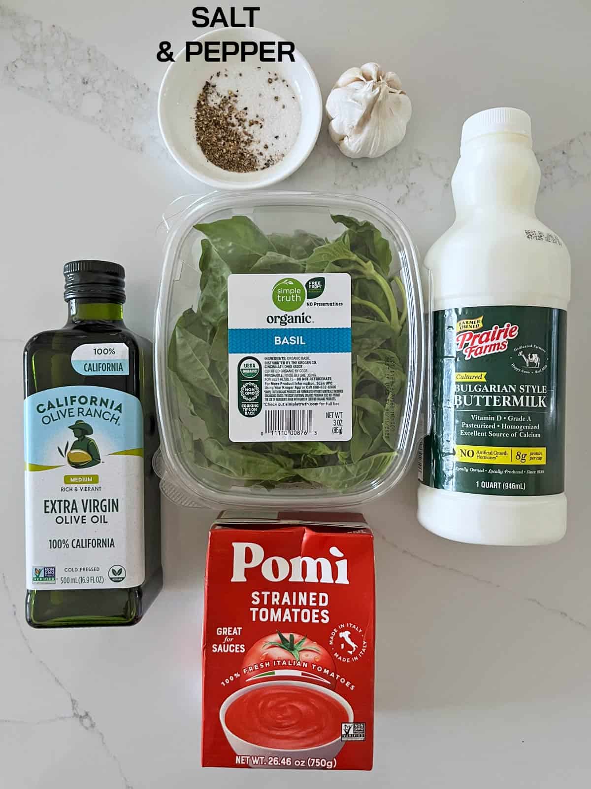 The ingredients needed to make a cold tomato soup.