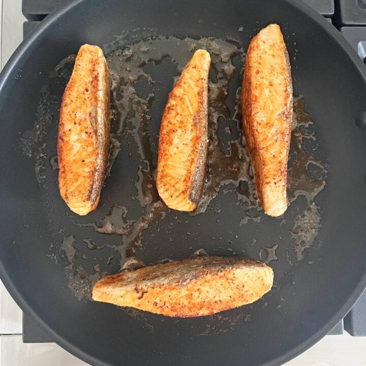 The salmon edges are cooked.