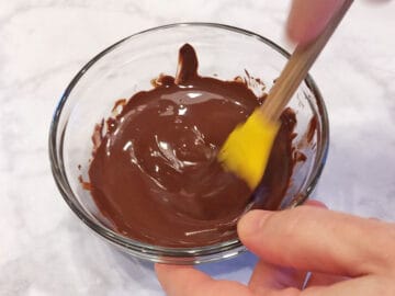 Stirring the melted chocolate.