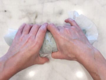 Rolling the sandwich.