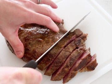 Slicing the steak.