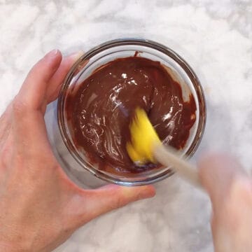 Stirring the melted chocolate.