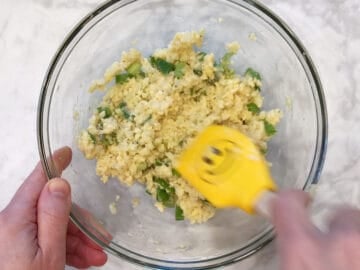 Mixing the ingredients in a bowl.