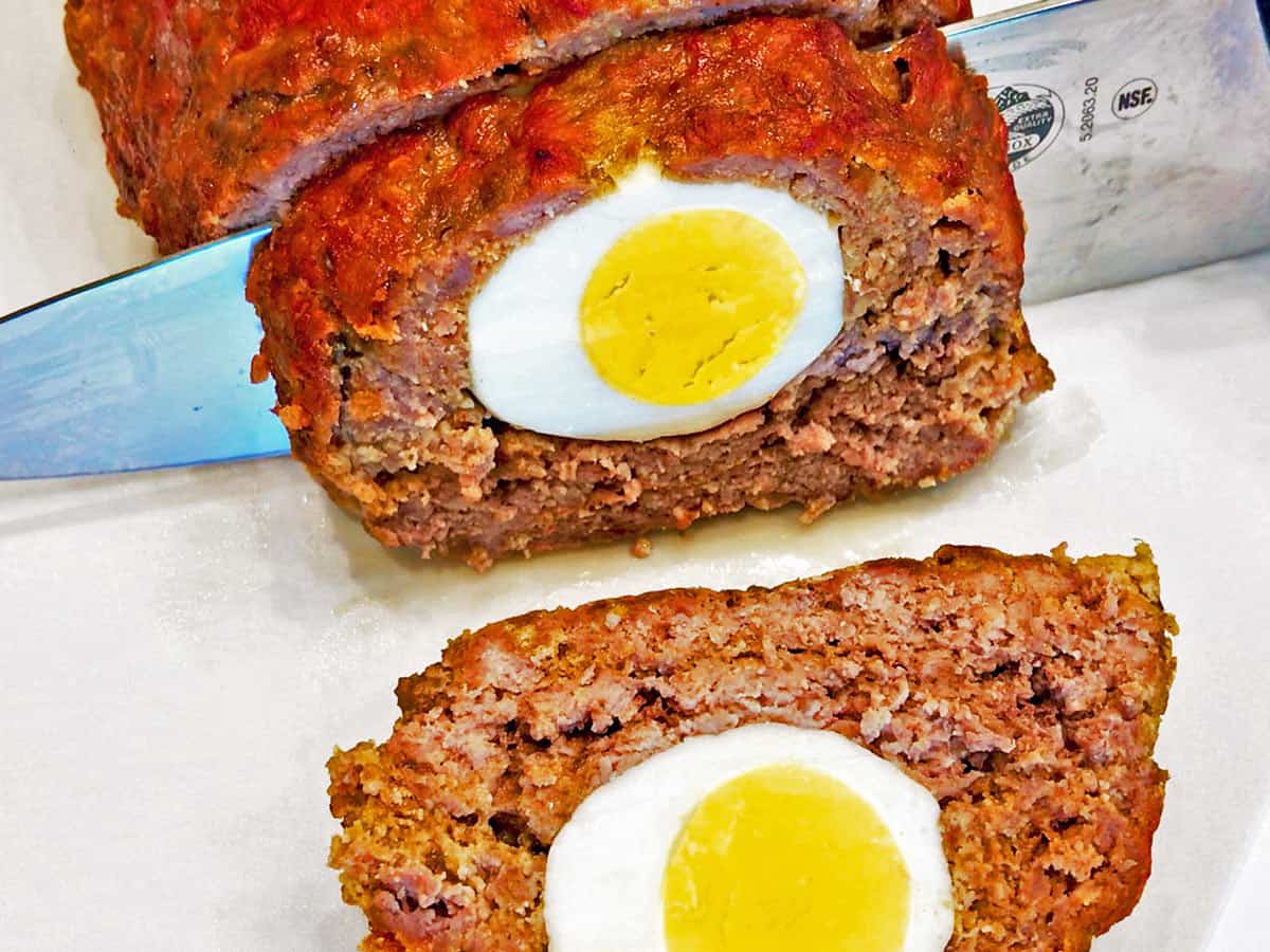Slicing the meatloaf.