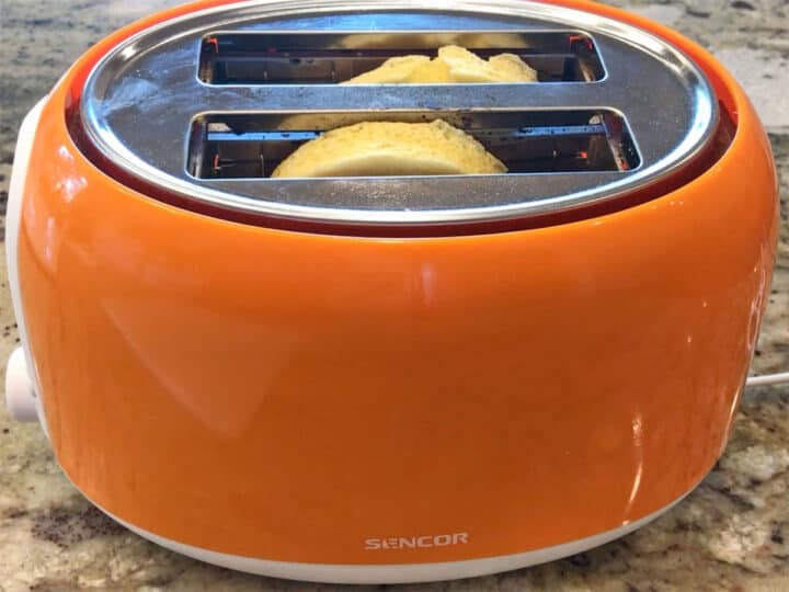 Toasting the muffin.