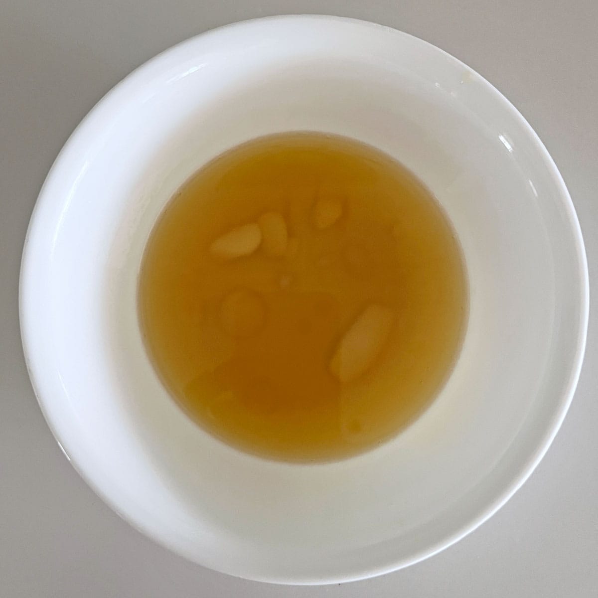 Melted cacao butter in a bowl.