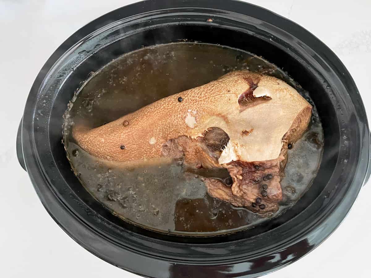 Cow tongue in the slow cooker.