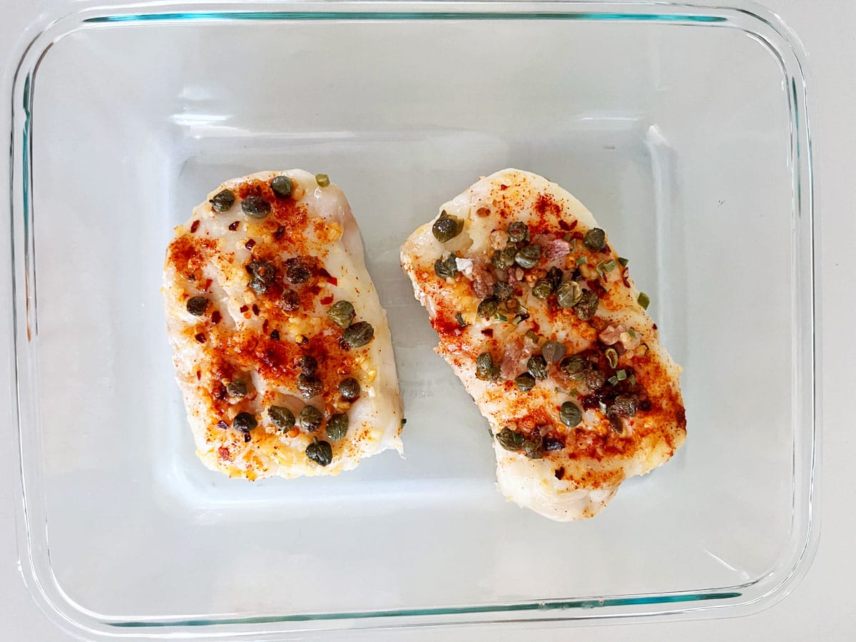 The leftovers are stored in a glass dish.