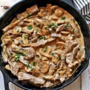Beef Stroganoff is served in a cast-iron skillet.
