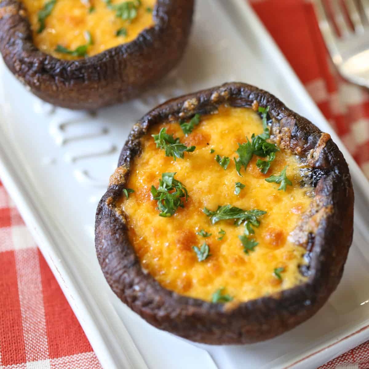 Portobello mushrooms stuffed with cheese.