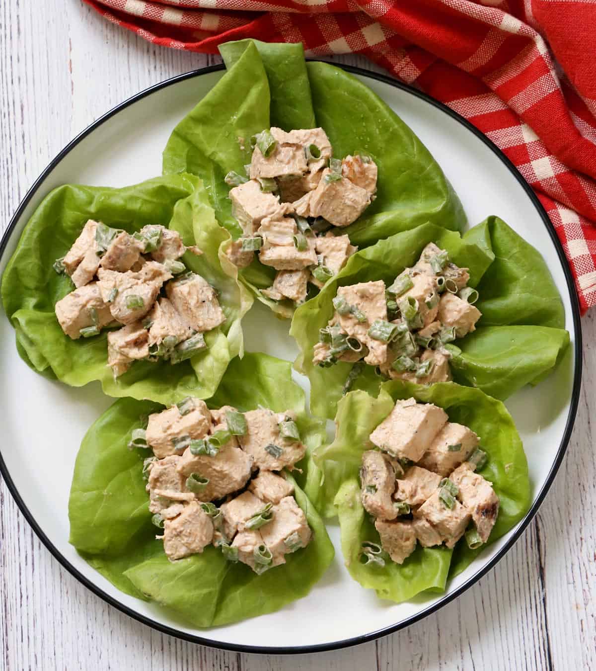 Chicken salad is served in lettuce cups.