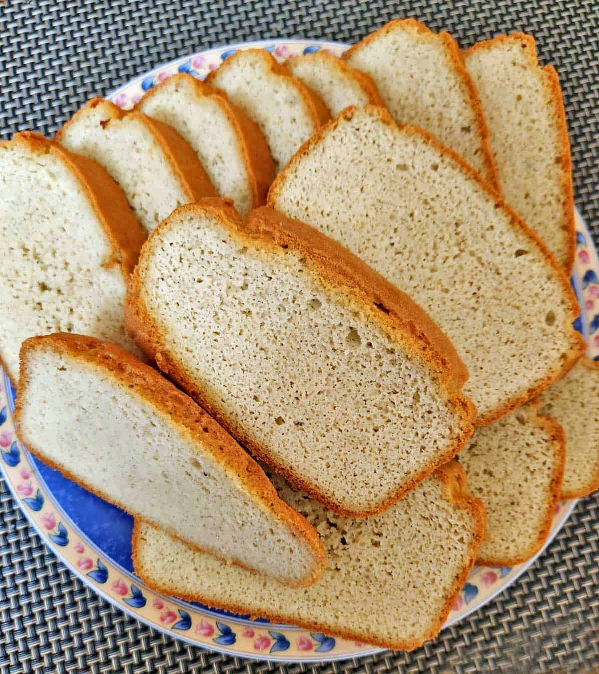 Sliced almond flour bread on a plate.