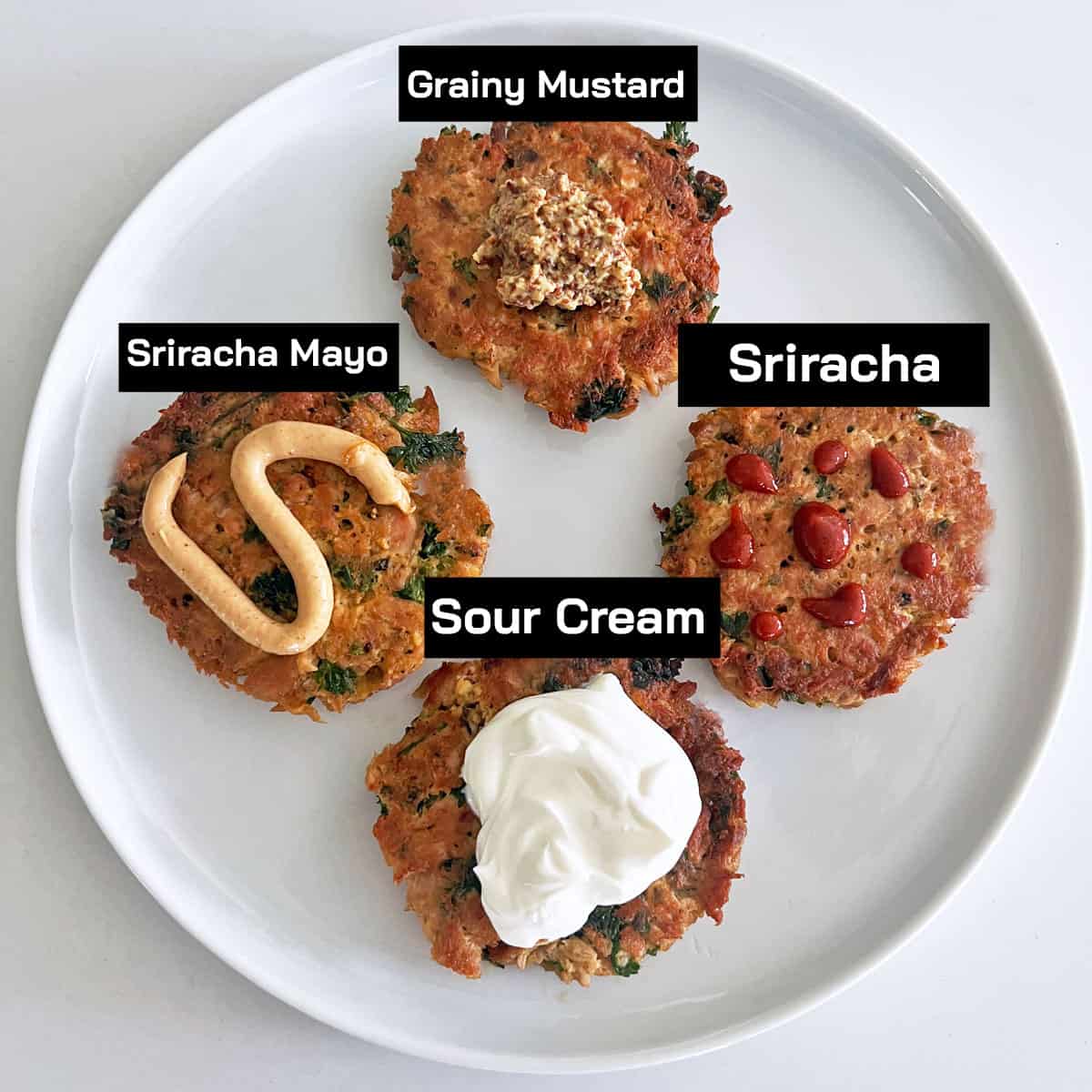 Toppings for tuna patties: sour cream, sriracha mayo, mustard, and sriracha sauce.