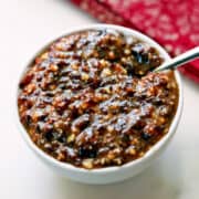 Charoset is served in a white bowl.