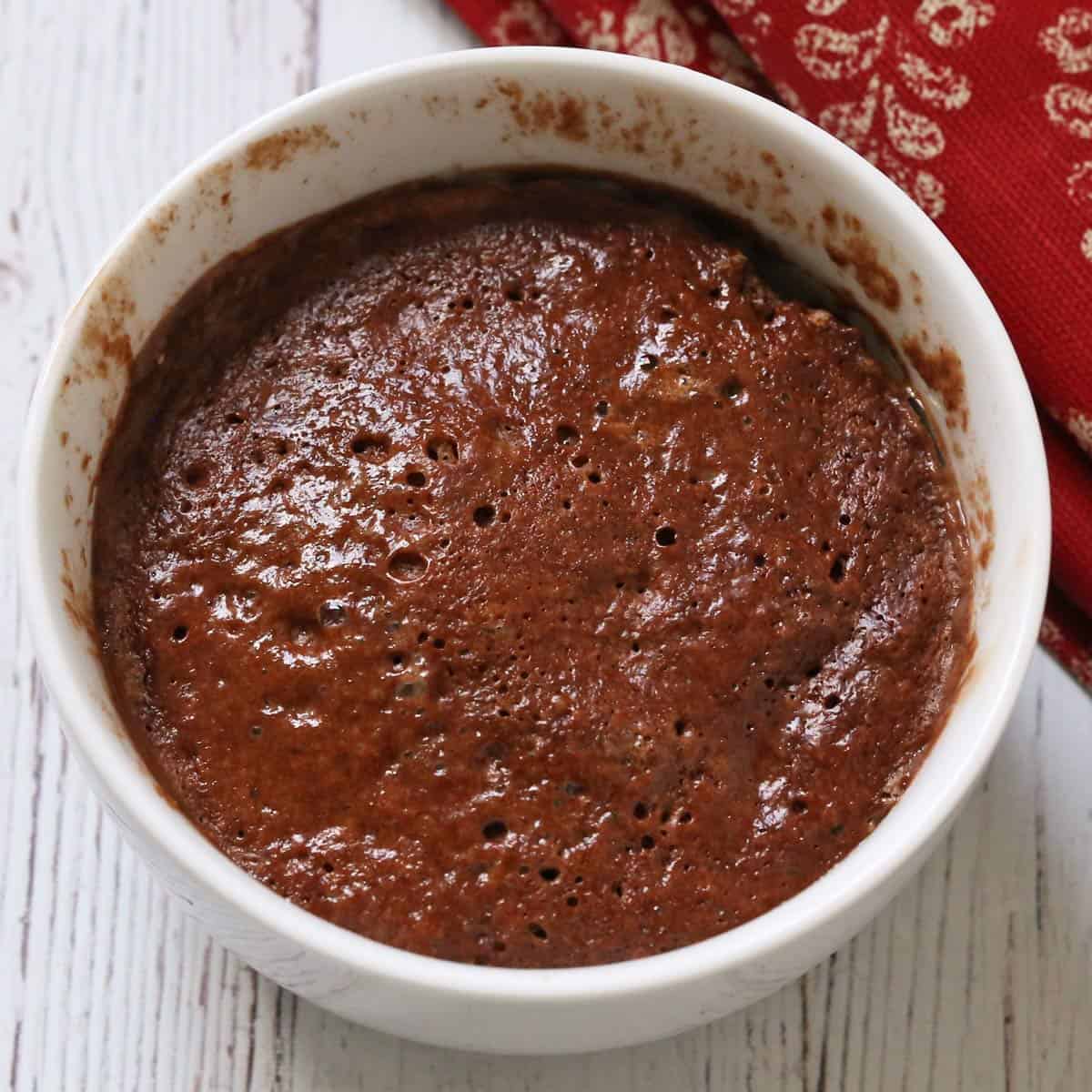 A chocolate mug cake made with liquid egg whites.