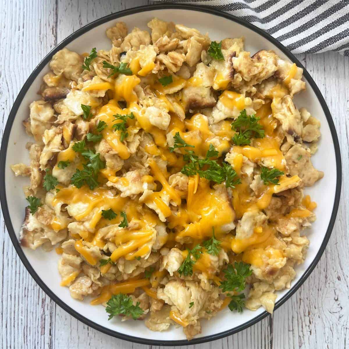 Savory matzo brei with cheese.