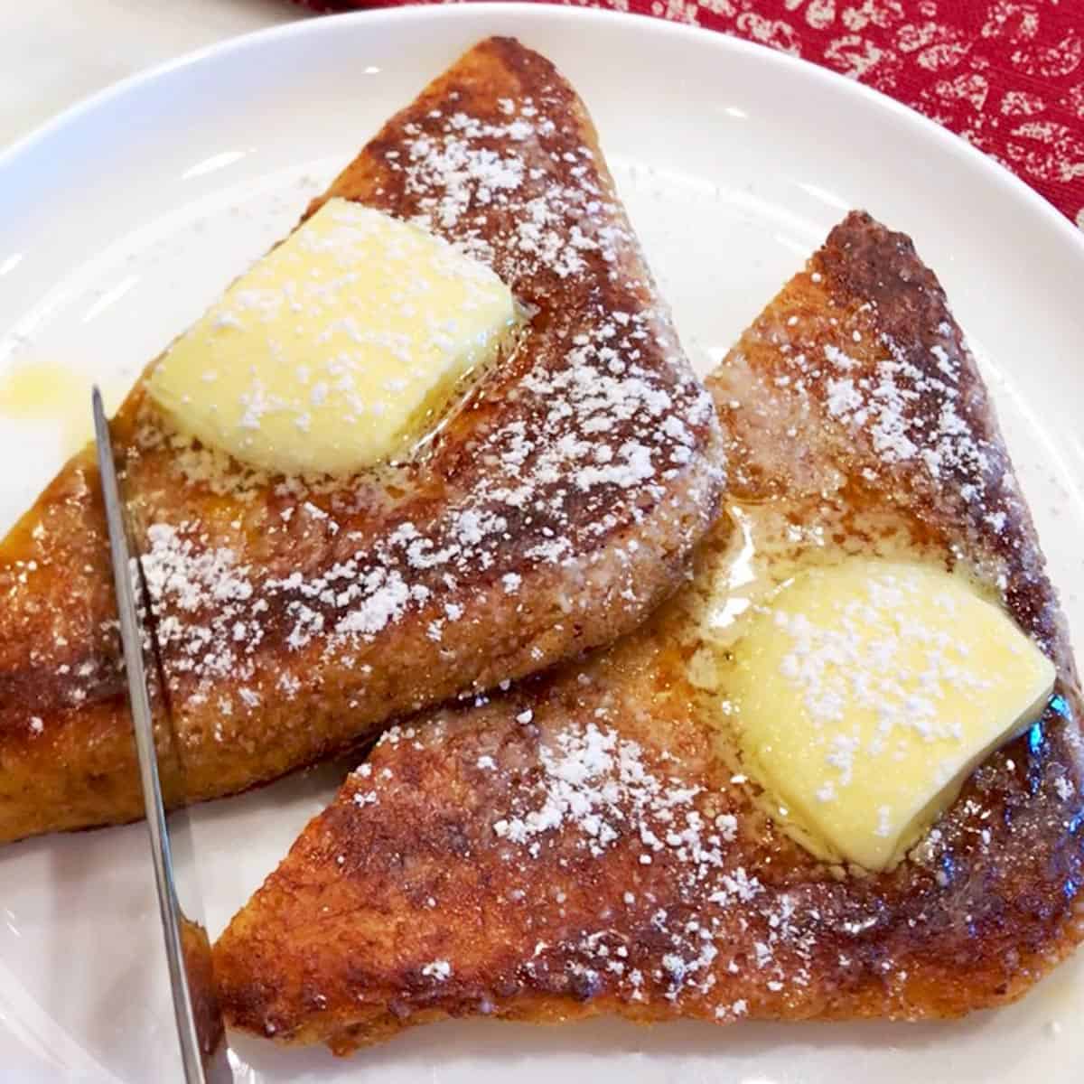 Two slices of keto French toast on a plate.