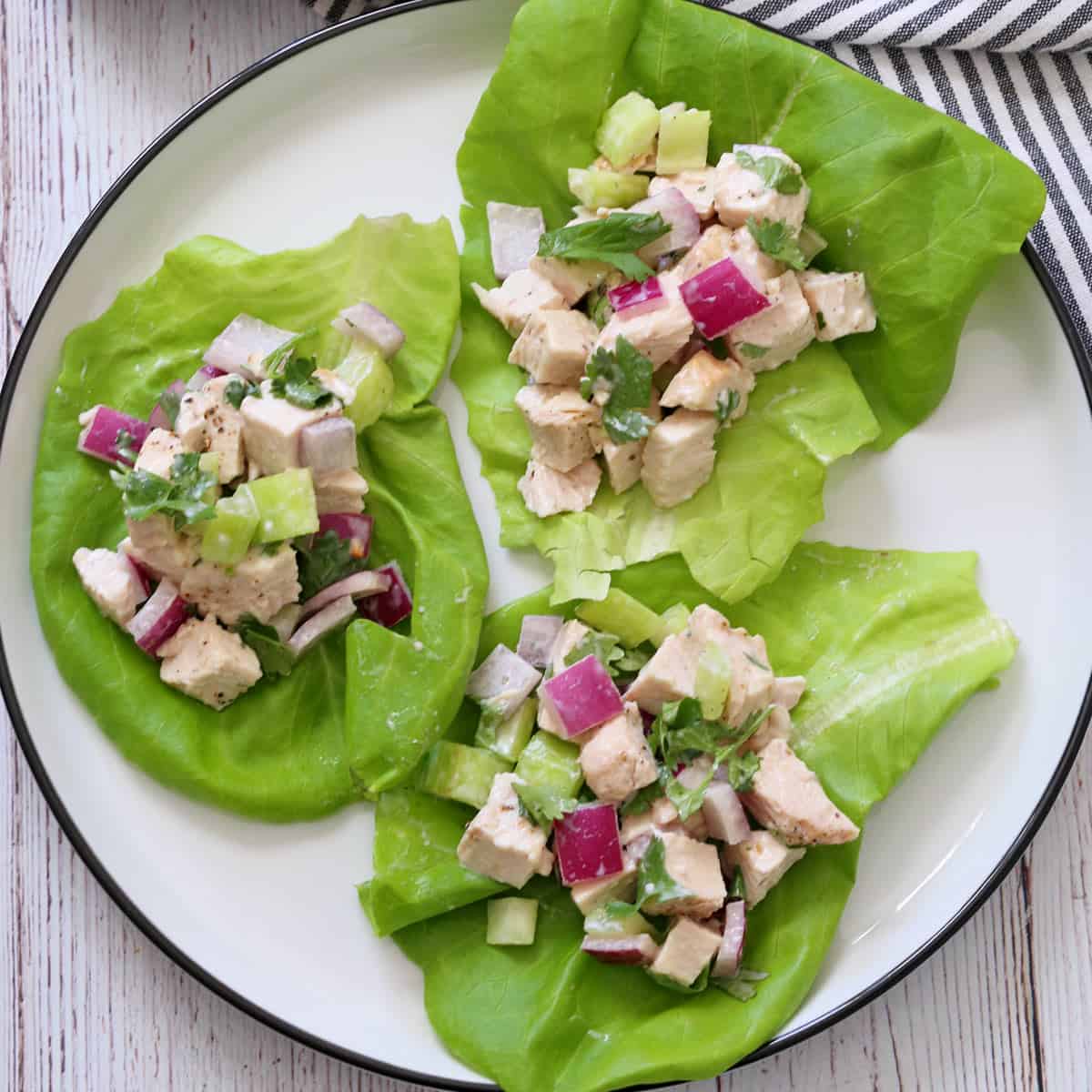 Turkey salad is served in lettuce wraps.