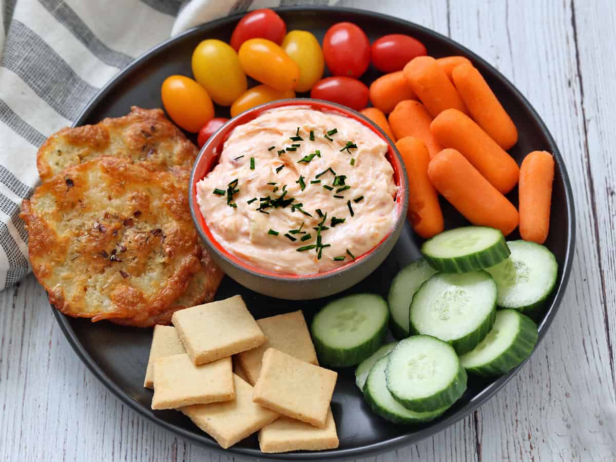 Almond flour crackers are served with salmon mousse.