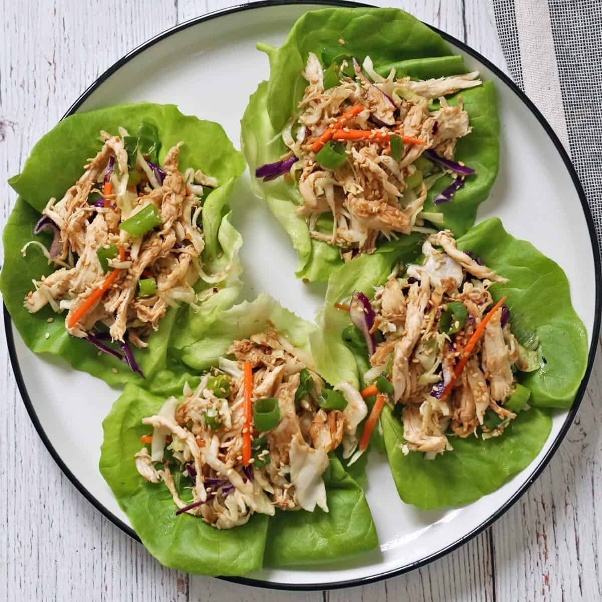 Chinese chicken salad is served in lettuce wraps.