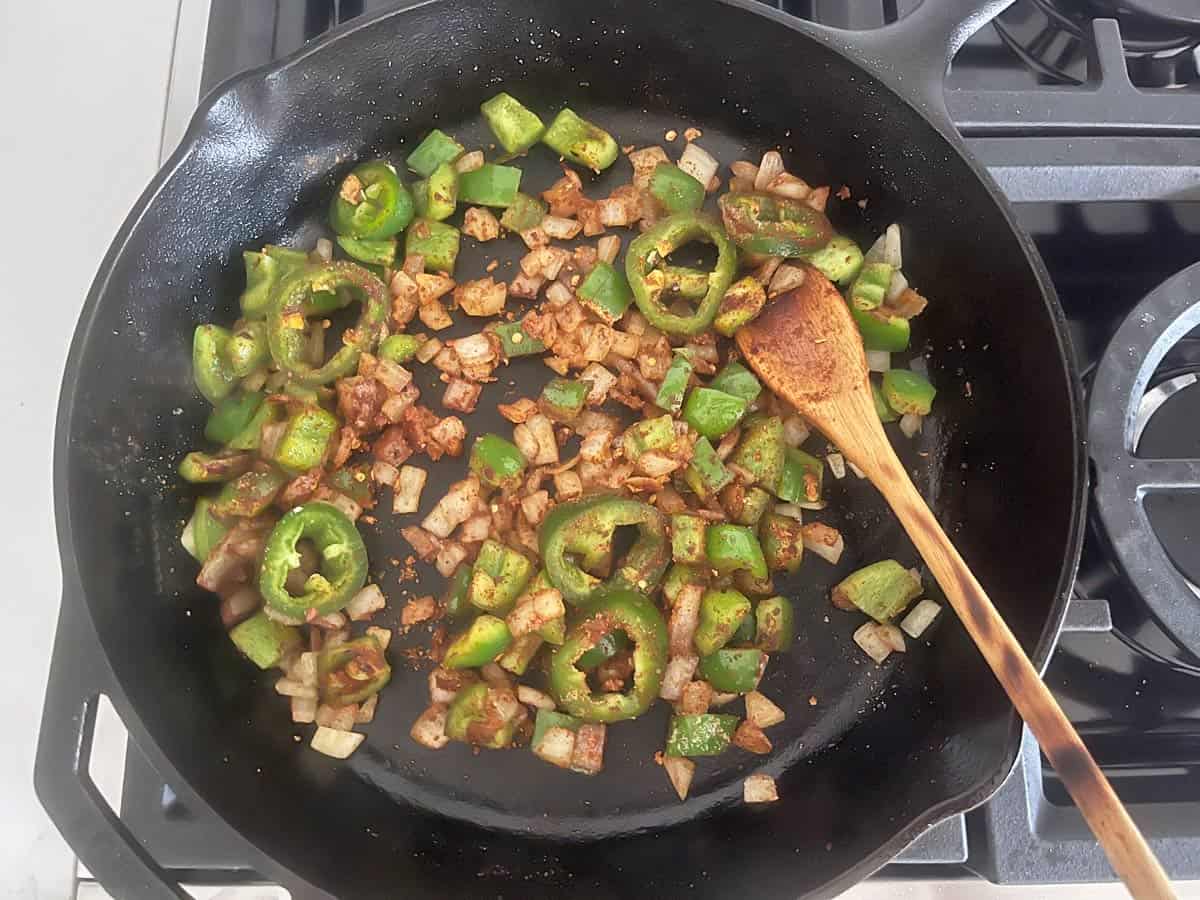 The peppers were added to the skillet.