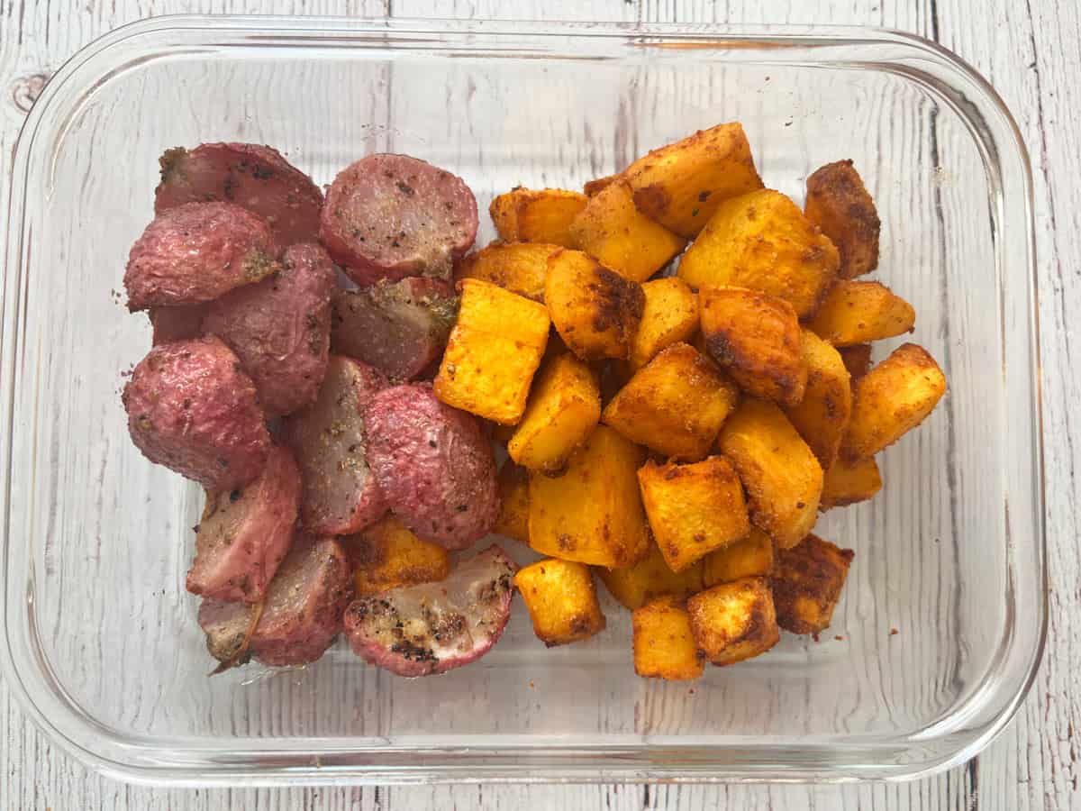Pumpkin and radish leftovers in a food storage container.