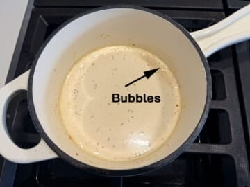 The heavy cream bubbles.