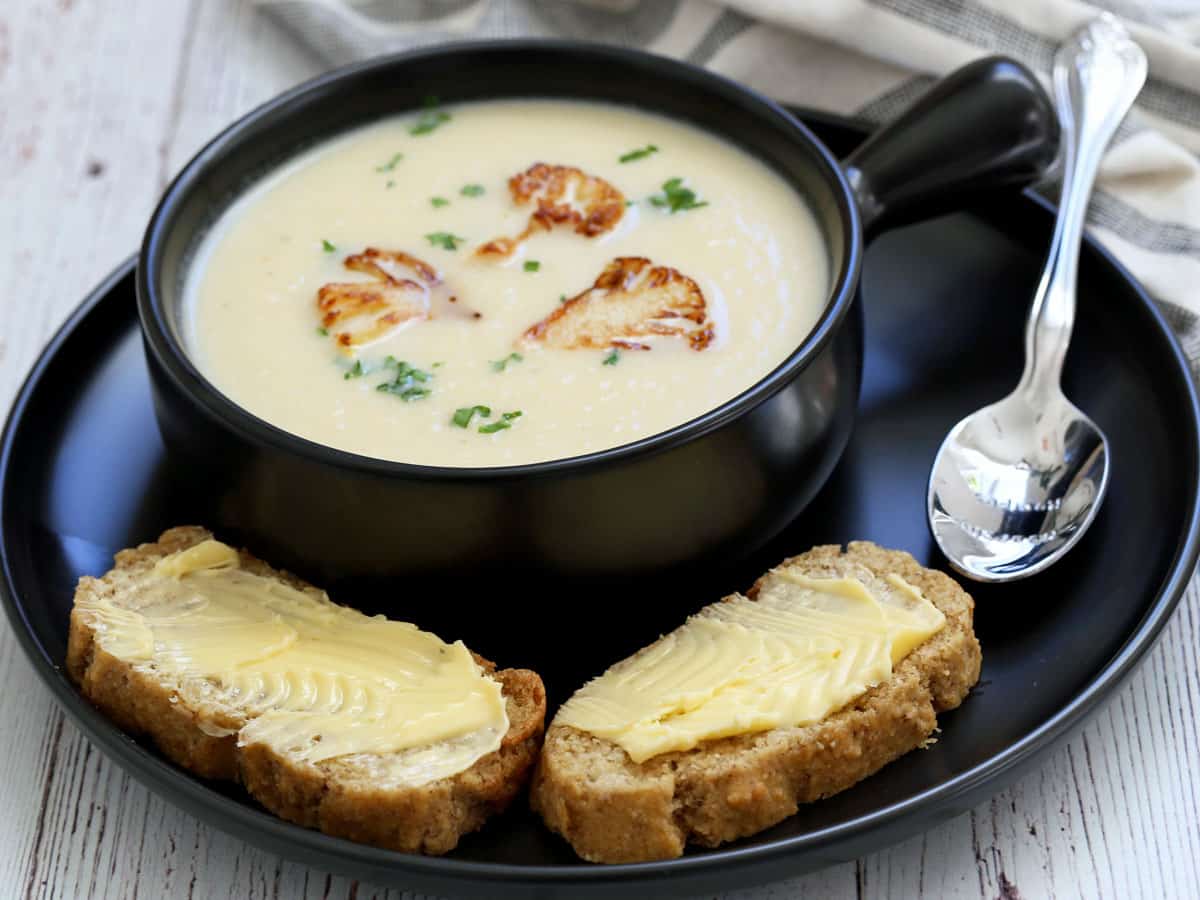 Almond flour bread is served with cauliflower soup.